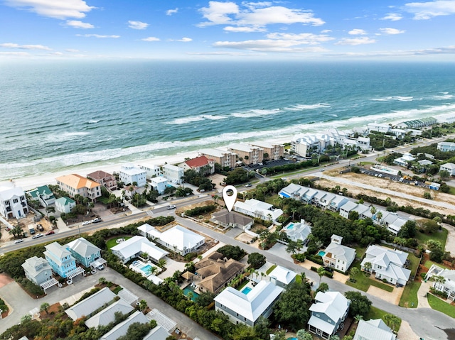 aerial view featuring a water view and a beach view