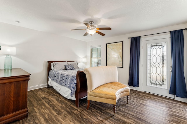 bedroom with dark hardwood / wood-style flooring, a textured ceiling, ceiling fan, and access to exterior