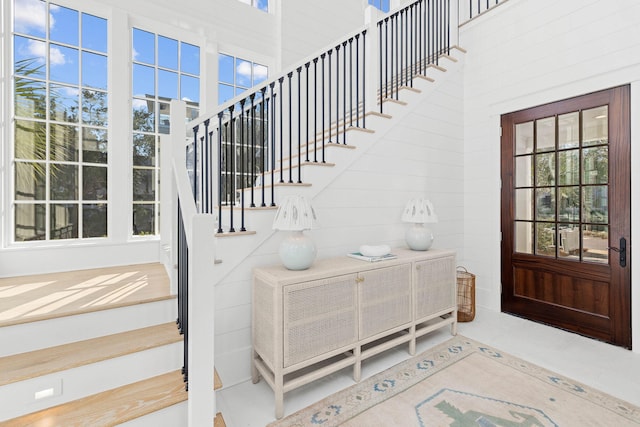 interior space with a wealth of natural light and a high ceiling