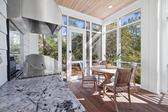 sunroom featuring wooden ceiling