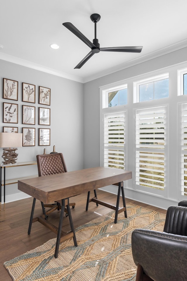 office area with ceiling fan, wood-type flooring, and ornamental molding