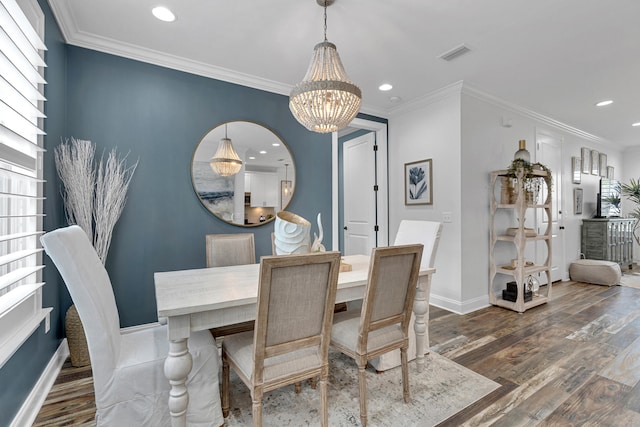 dining space featuring dark hardwood / wood-style floors and crown molding