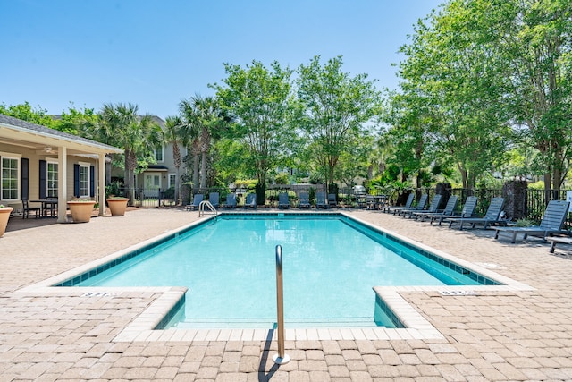 view of pool featuring a patio