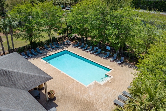 view of swimming pool with a patio area