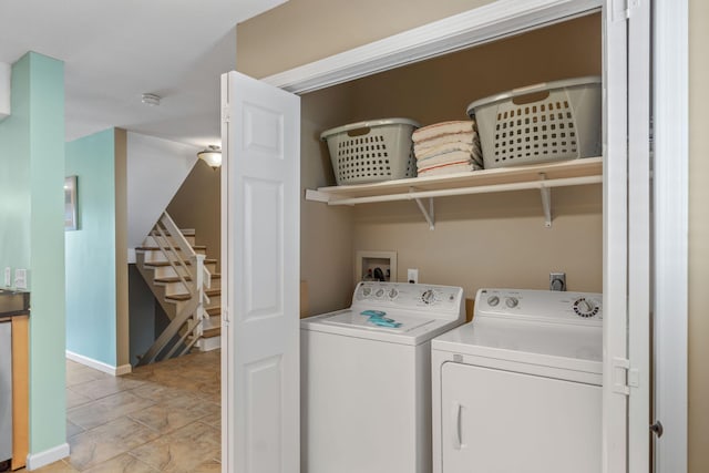 laundry area with washer and dryer
