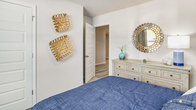 bedroom featuring light hardwood / wood-style flooring