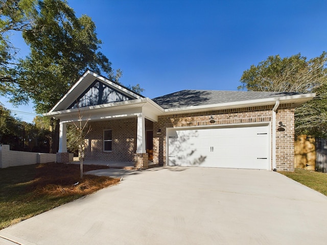 craftsman house with a garage