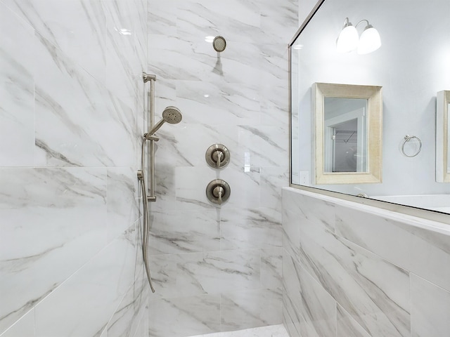 bathroom featuring a tile shower