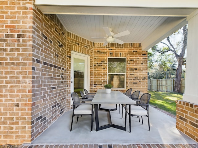 view of patio featuring ceiling fan