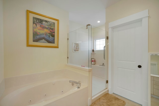 bathroom featuring plus walk in shower and tile patterned flooring