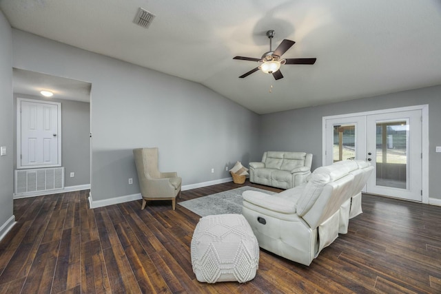 living room featuring lofted ceiling, ceiling fan, french doors, and dark hardwood / wood-style floors