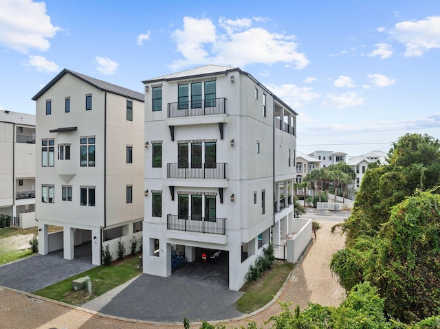 32 Cote Dazur Dr, Santa Rosa Beach, FL 32459 - view of property with a carport and driveway