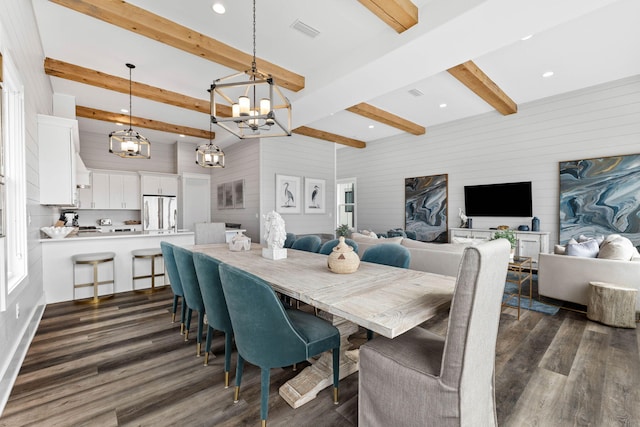 dining space with lofted ceiling with beams, a notable chandelier, and dark wood-type flooring