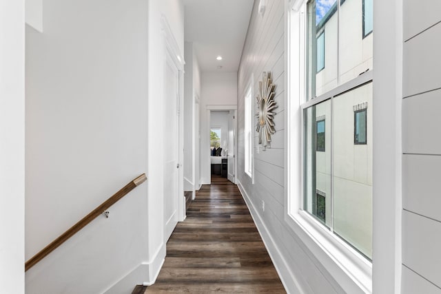 hall with dark hardwood / wood-style floors