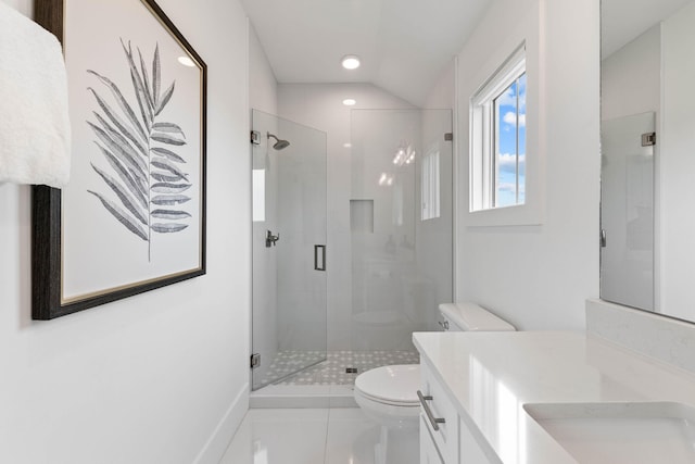 bathroom featuring tile patterned floors, a shower with door, vaulted ceiling, vanity, and toilet