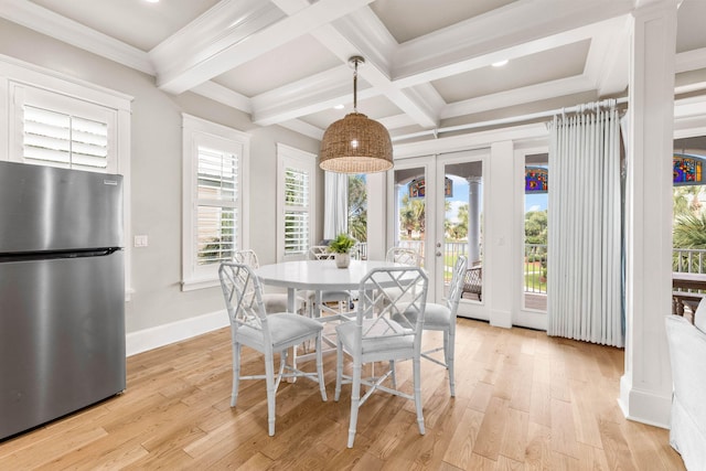 dining space with french doors, coffered ceiling, crown molding, light hardwood / wood-style floors, and beam ceiling