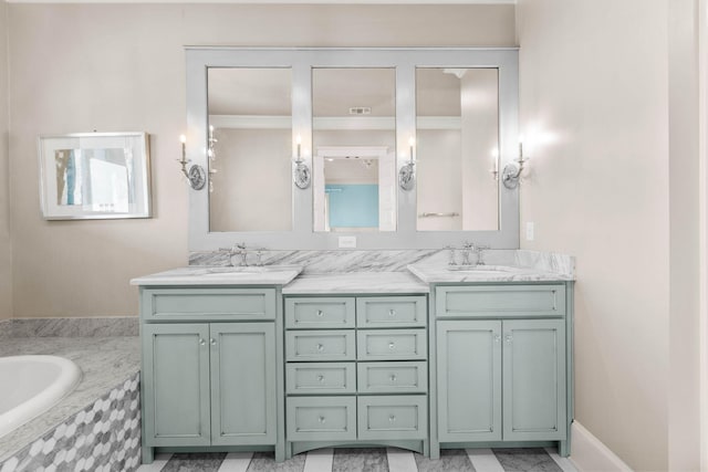 bathroom with vanity and a relaxing tiled tub