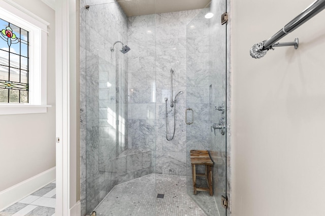 bathroom featuring tile patterned floors and walk in shower