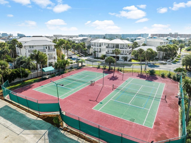 view of sport court with basketball hoop