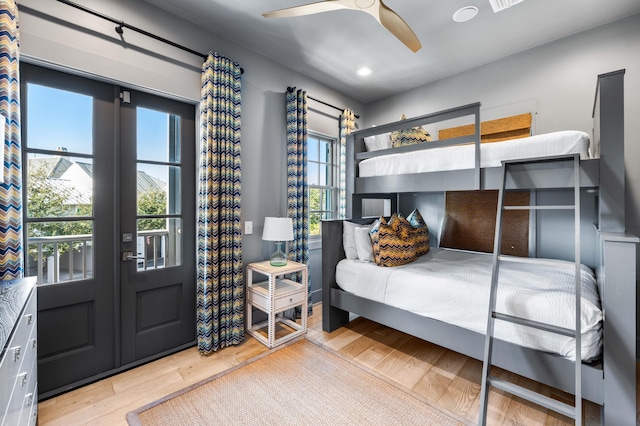 bedroom featuring light hardwood / wood-style floors and ceiling fan