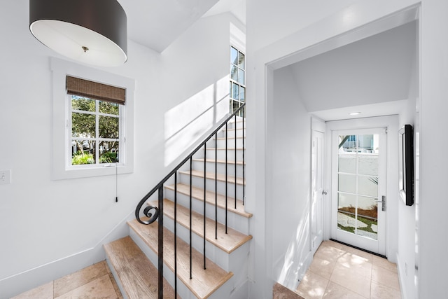 entrance foyer with light tile patterned floors