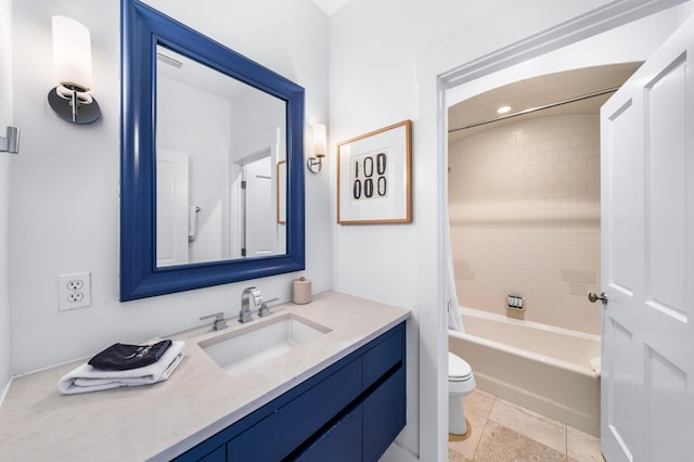 full bathroom featuring vanity, toilet, and tiled shower / bath