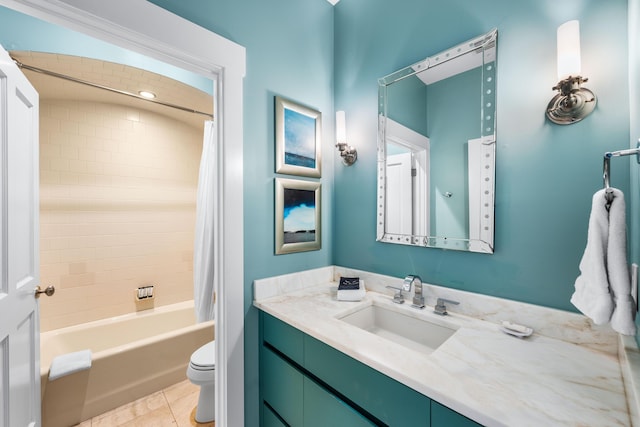 full bathroom with tile patterned flooring, shower / bath combo, toilet, and vanity