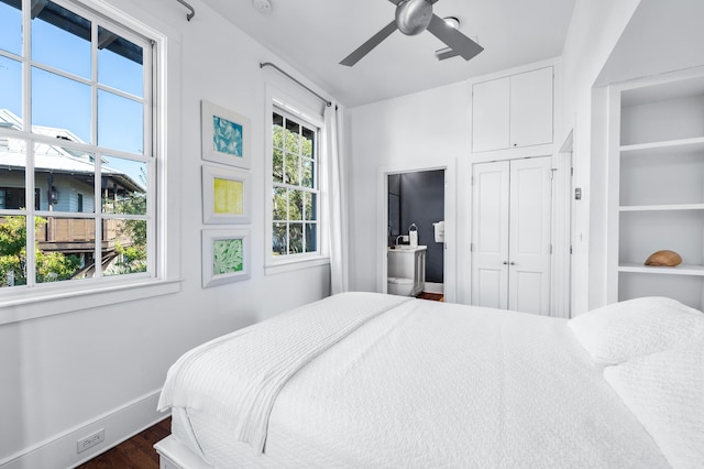 bedroom with ceiling fan, dark hardwood / wood-style floors, and a closet