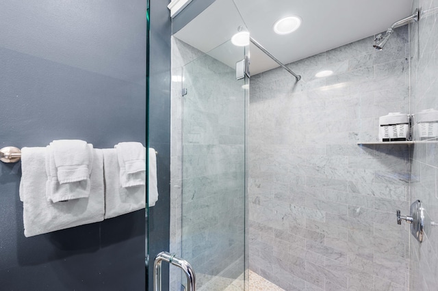 bathroom with an enclosed shower