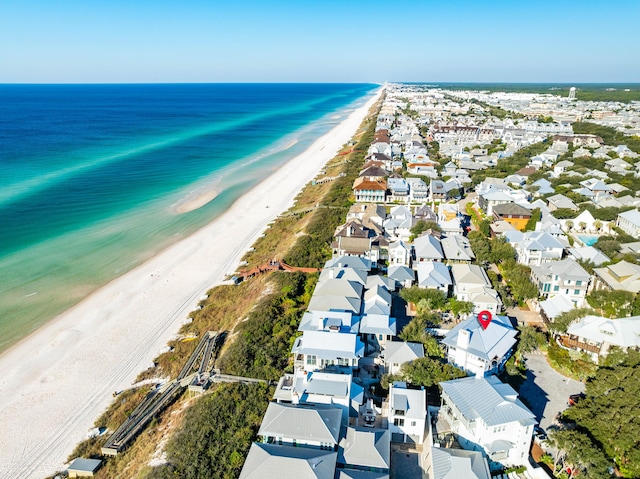 bird's eye view with a beach view and a water view