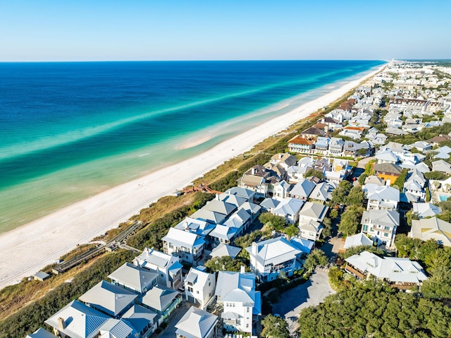 bird's eye view with a beach view and a water view