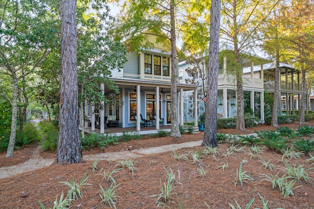 view of front facade featuring a porch and a balcony