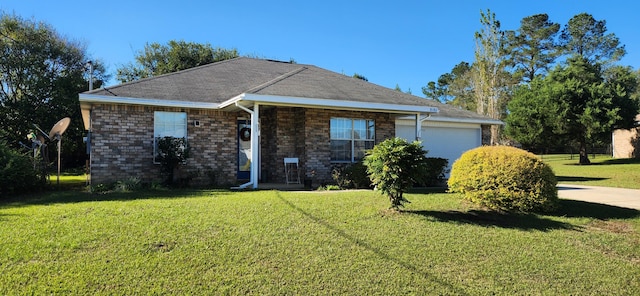 view of front of house featuring a garage and a front yard