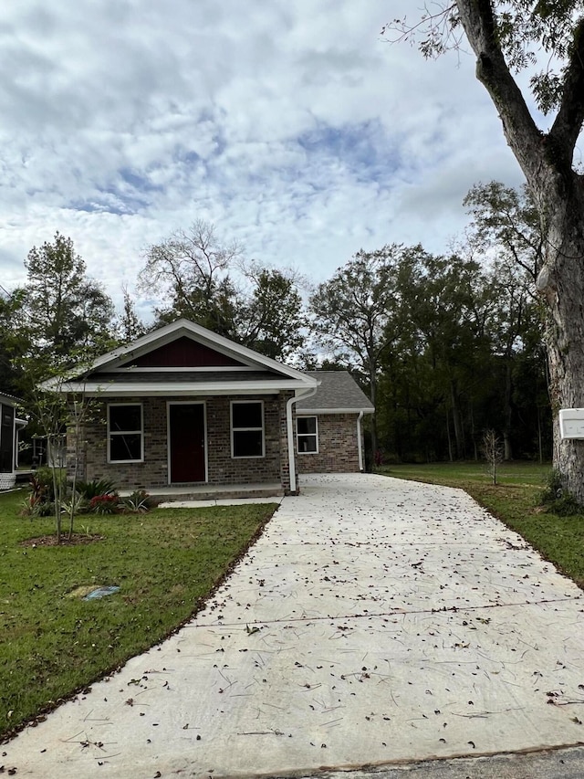 bungalow with a front lawn