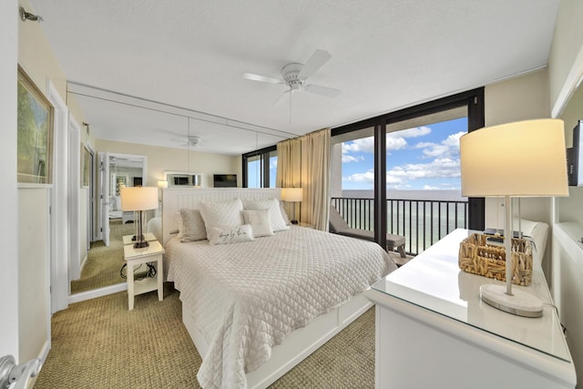4100 E Co Hwy Unit 30A 1102 # 1102, Santa Rosa Beach, FL 32459 - carpeted bedroom featuring access to outside, floor to ceiling windows, and a ceiling fan