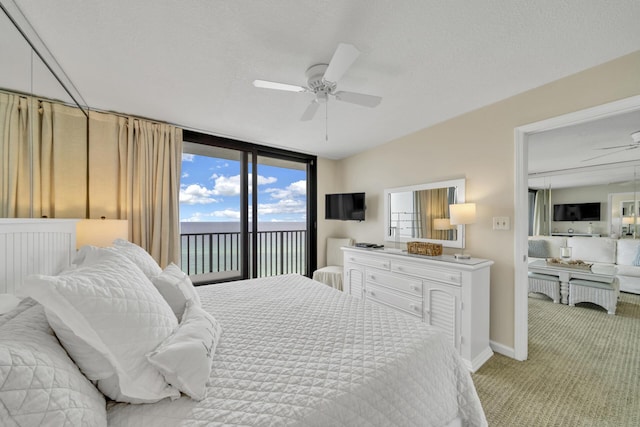 4100 E Co Hwy Unit 30A 1102 # 1102, Santa Rosa Beach, FL 32459 - bedroom featuring light carpet, access to outside, floor to ceiling windows, a ceiling fan, and baseboards