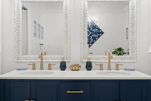 bathroom featuring vanity and ornamental molding