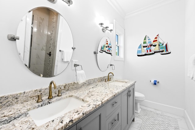 bathroom with vanity, crown molding, a shower, tile patterned floors, and toilet