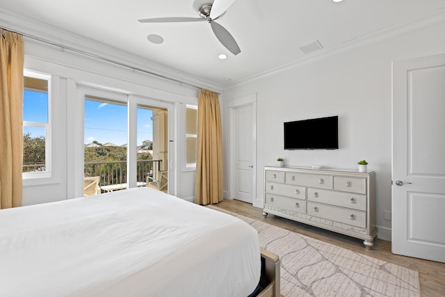 bedroom featuring light hardwood / wood-style floors, ceiling fan, ornamental molding, and access to outside