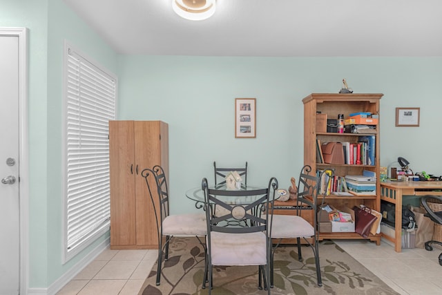 101 Old Ferry Rd Unit 27A, Shalimar, FL 32579 - dining area featuring light tile patterned flooring and plenty of natural light