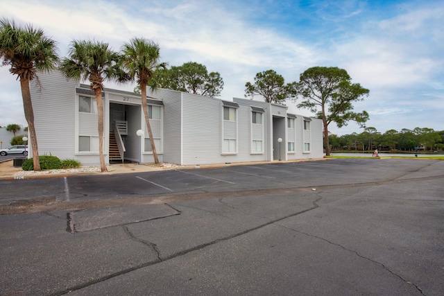 101 Old Ferry Rd Unit 27A, Shalimar, FL 32579 - view of property featuring uncovered parking and stairway