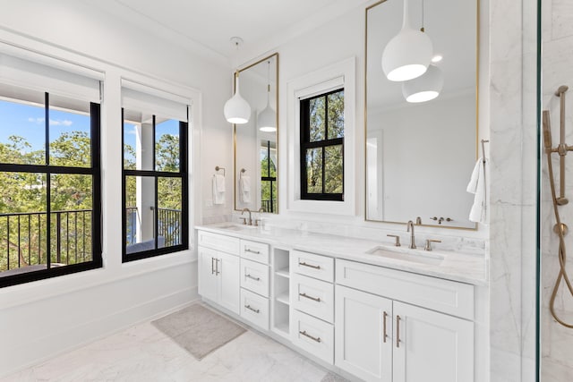 bathroom featuring vanity and crown molding