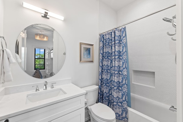 full bathroom with toilet, vanity, and shower / bathtub combination with curtain