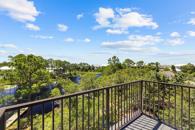 balcony featuring a water view