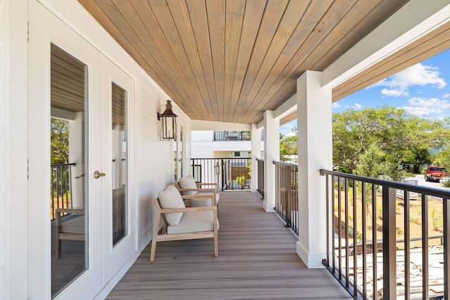 wooden deck with french doors