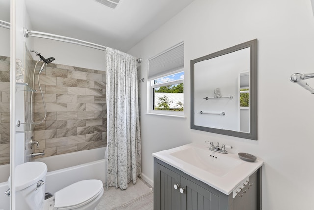 full bathroom with tile patterned floors, vanity, toilet, and shower / tub combo