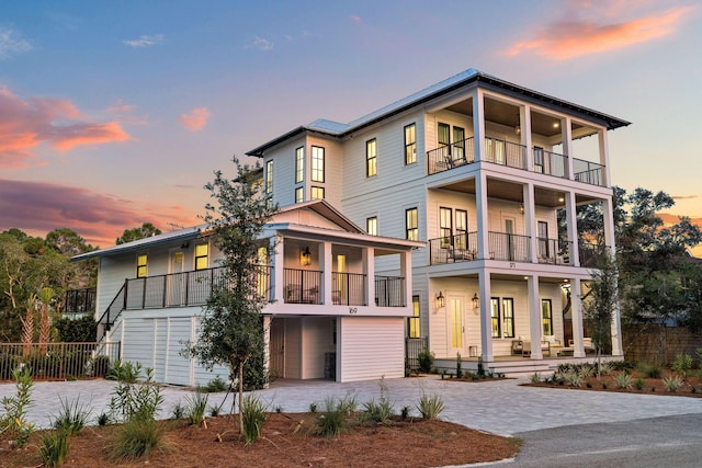 view of front of property with a balcony