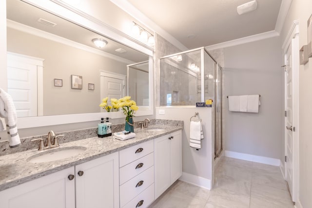 133 Grande Pointe Cir, Inlet Beach, FL 32461 - bathroom with ornamental molding, double vanity, a stall shower, and tile patterned floors