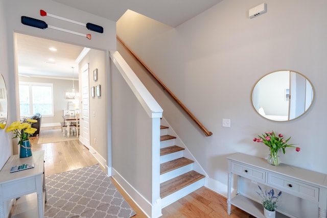 133 Grande Pointe Cir, Inlet Beach, FL 32461 - stairway with wood finished floors, ornamental molding, and recessed lighting