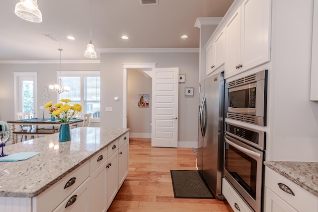 133 Grande Pointe Cir, Inlet Beach, FL 32461 - kitchen with ornamental molding, stainless steel appliances, white cabinetry, a chandelier, and light wood-style flooring